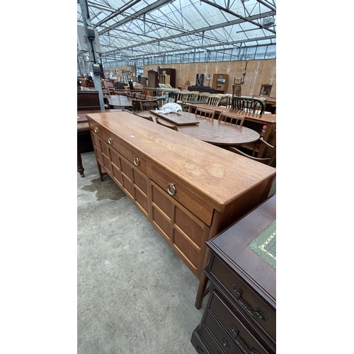 2714 - A NATHAN RETRO TEAK SIDEBOARD ENCLOSING THREE DRAWERS AND THREE CUPBOARDS, 72
