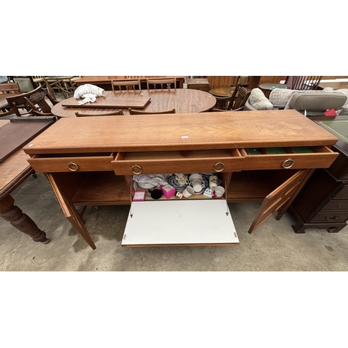 2714 - A NATHAN RETRO TEAK SIDEBOARD ENCLOSING THREE DRAWERS AND THREE CUPBOARDS, 72