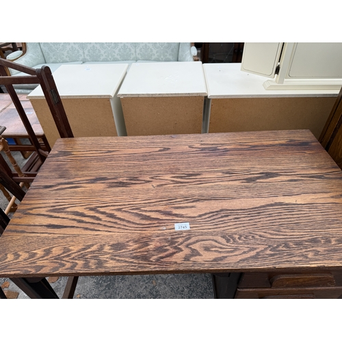 2745 - A MID 20TH CENTURY OAK SINGLE PEDESTAL DESK ENCLOSING THREE DRAWERS, 39
