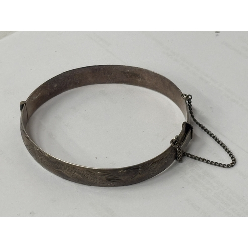 534 - A HALLMARKED BIRMINGHAM SILVER BANGLE GROSS WEIGHT 23.83 GRAMS
