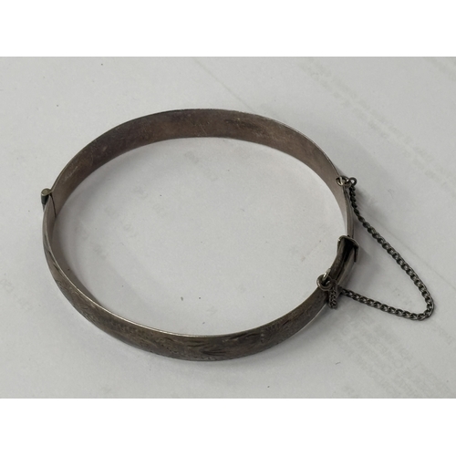 534 - A HALLMARKED BIRMINGHAM SILVER BANGLE GROSS WEIGHT 23.83 GRAMS