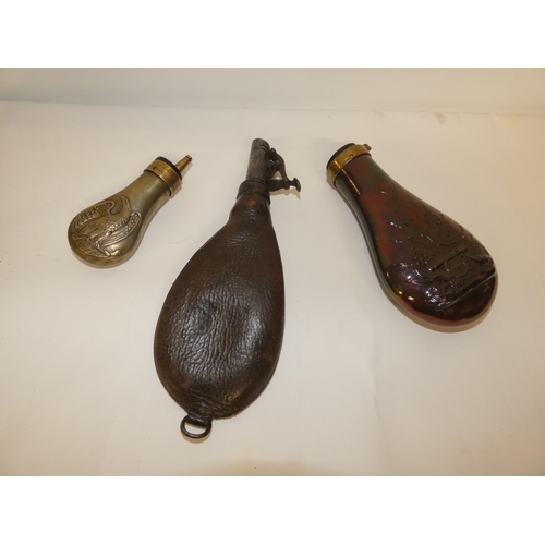 A 19TH CENTURY LEATHER SHOT FLASK AND TWO POWDER FLASKS