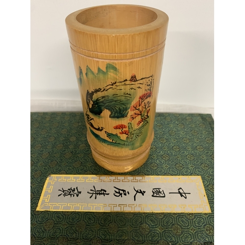 312 - A VINTAGE CHINESE CALLIGRAPHY SET TO INCLUDE A VARIETY OF BRUSHES, INK STONE, PORCELAIN WATER POT ET... 