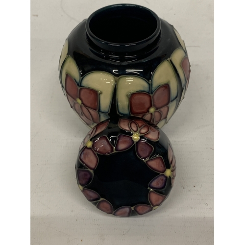 414 - A MOORCROFT VIOLET PATTERN GINGER JAR WITH COVER, HEIGHT 11CM