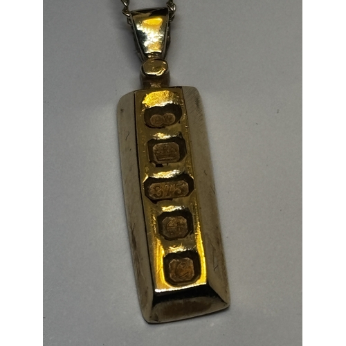 508 - A 9 CARAT GOLD INGOT AND CHAIN GROSS WEIGHT 5.39 GRAMS IN A PRESENTATION BOX