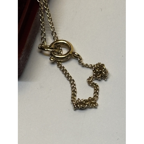 508 - A 9 CARAT GOLD INGOT AND CHAIN GROSS WEIGHT 5.39 GRAMS IN A PRESENTATION BOX