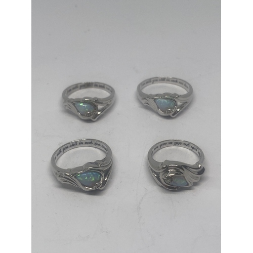 635 - FOUR SILVER AND OPAL RINGS GROSS WEIGHT 16.62 GRAMS
