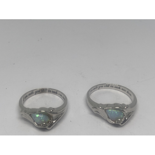 635 - FOUR SILVER AND OPAL RINGS GROSS WEIGHT 16.62 GRAMS