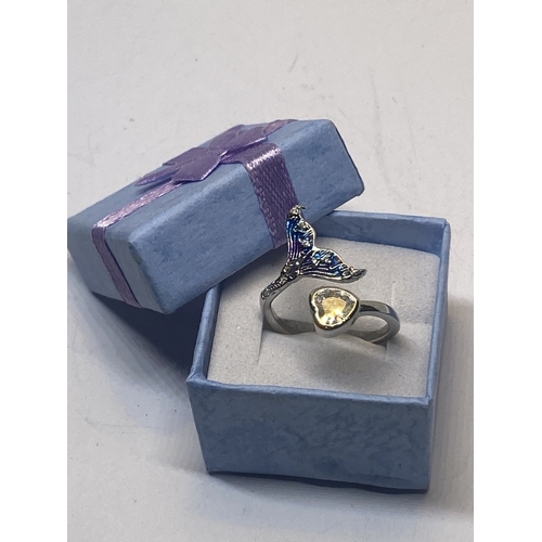 642 - A MARKED 925 FISHTAIL HEART RING IN A PRESENTATION BOX