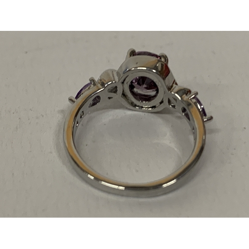 644 - A MARKED 925 AMETHYST RING SIZE N IN A PRESENTATION BOX