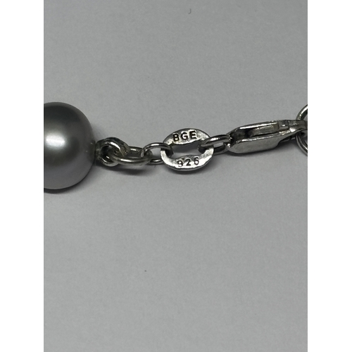 650 - A PEARL BRACELET WITH A SILVER CLASP