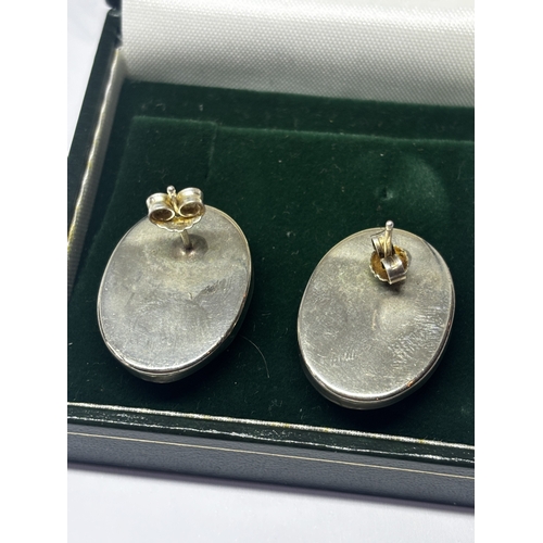 653 - A PAIR OF SILVER AND ENAMEL EARRINGS IN A PRESENTATION BOX