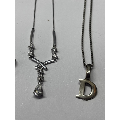 655 - FOUR SILVER NECKLACES WITH PENDANTS GROSS WEIGHT 12.35 GRAMS