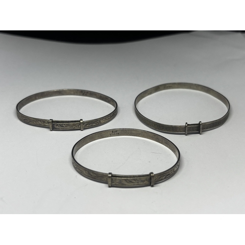 675 - THREE SILVER BANGLES GROSS WEIGHT 16.71 GRAMS