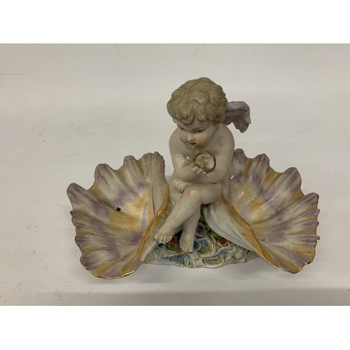 13 - AN EARLY 20TH CENTURY GERMAN PORCELAIN FIGURE OF A SHELL ANGEL WITH WINGS