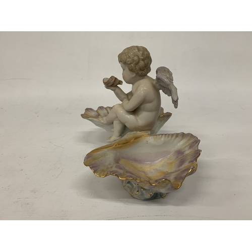 13 - AN EARLY 20TH CENTURY GERMAN PORCELAIN FIGURE OF A SHELL ANGEL WITH WINGS