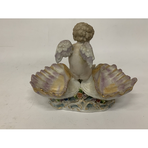 13 - AN EARLY 20TH CENTURY GERMAN PORCELAIN FIGURE OF A SHELL ANGEL WITH WINGS