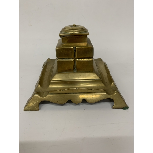 104 - A VINTAGE BRASS INKWELL