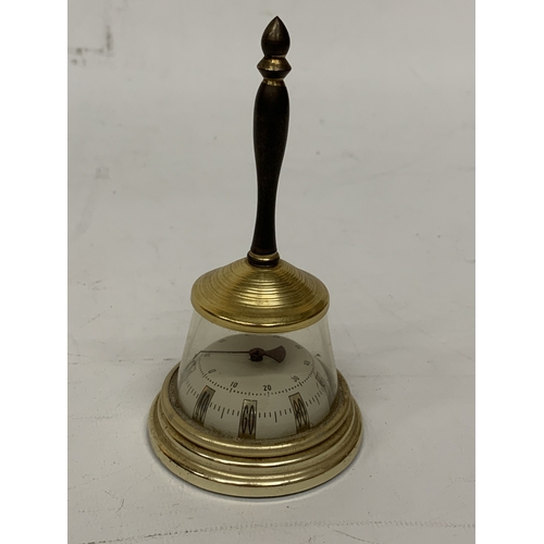 109 - A VINTAGE BRASS AND GLASS TABLE THERMOMETER