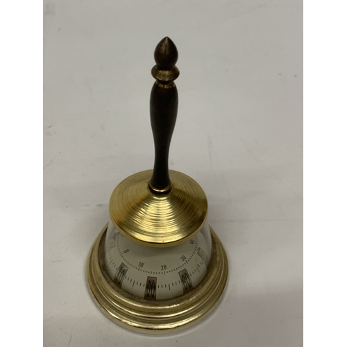 109 - A VINTAGE BRASS AND GLASS TABLE THERMOMETER