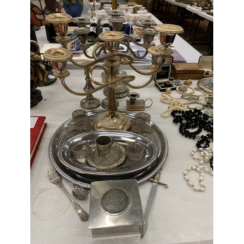 115 - A QUANTITY OF SILVER PLATE TO INCLUDE CANDLARBRA'S, TRAYS, NAPKIN RINGS, ETC.,