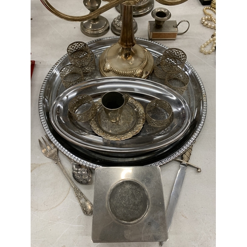 115 - A QUANTITY OF SILVER PLATE TO INCLUDE CANDLARBRA'S, TRAYS, NAPKIN RINGS, ETC.,
