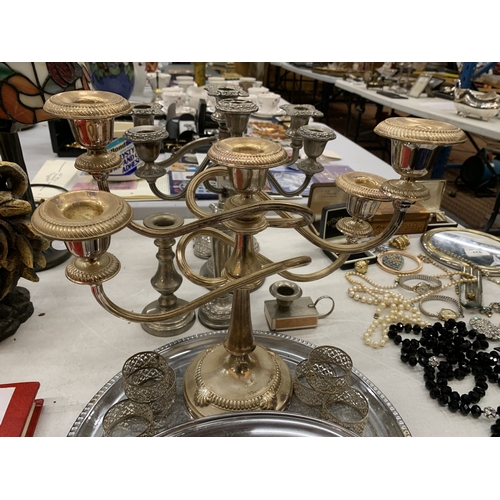 115 - A QUANTITY OF SILVER PLATE TO INCLUDE CANDLARBRA'S, TRAYS, NAPKIN RINGS, ETC.,