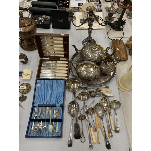 123 - AN ASSORTMENT OF SILVERPLATE TO INCLUDE A TEASET, TRAY, TEA STRAINERS, LADELS,  FLATWARE, ETC.,