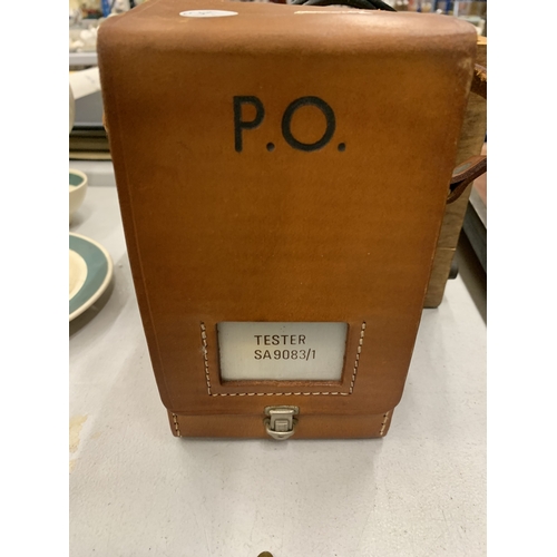 155A - A POST OFFICE TESTER IN A LEATHER CASE TOGETHER WITH A FURTHER TECHNICAL INSTRUMENT IN A WOODEN BOX