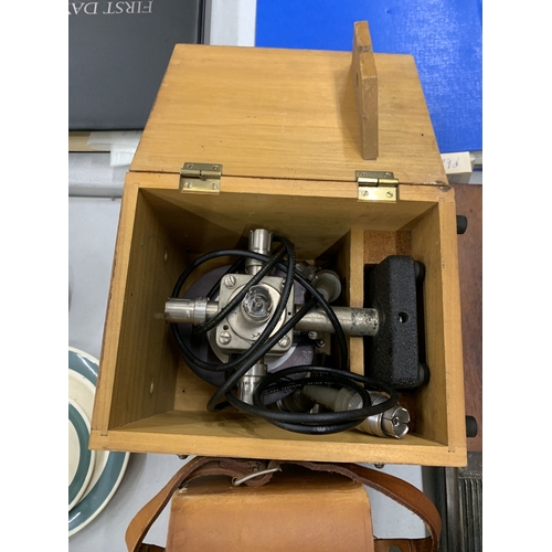 155A - A POST OFFICE TESTER IN A LEATHER CASE TOGETHER WITH A FURTHER TECHNICAL INSTRUMENT IN A WOODEN BOX