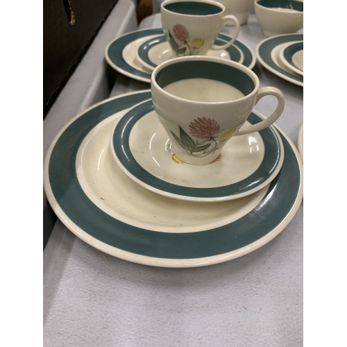 156 - A SUSIE COOPER PART TEA SET TO INCLUDE A TEAPOT, FOUR TRIOS AND SUGAR BOWL