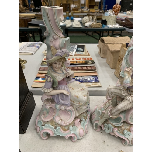 195 - A PAIR OF VINTAGE GERMAN BISQUE FIGURAL CANDLESTICKS