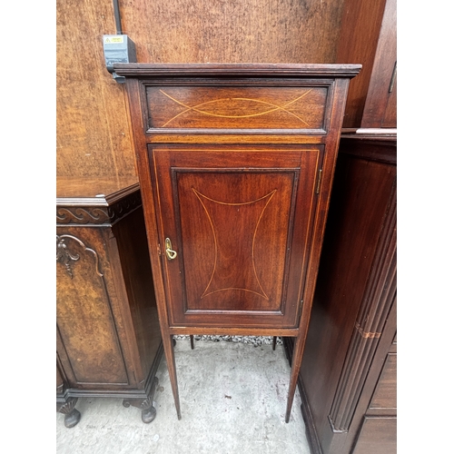 2510 - AN EDWARDIAN MAHOGANY AND INLAID SINGLE DOOR CUPBOARD ON TAPERING LEGS, 19