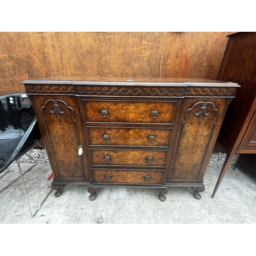 2511 - A 19TH CENTURY STYLE MINIATURE WALNUT BREAKFRONT SIDEBOARD ENCLOSING DRAWERS AND TWO CUPBOARDS ON CA... 
