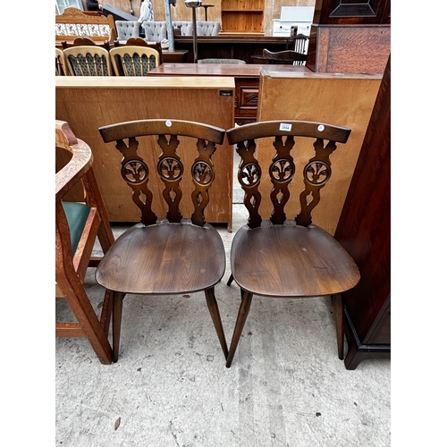 2554 - A PAIR OF ERCOL BLUE LABEL PLUME OF FEATHERS DINING CHAIRS