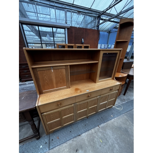 2589 - A NATHAN STYLE RETRO COCKTAIL SIDEBOARD ENCLOSING DROP DOWN SECTION, FOUR CUPBOARDS, THREE DRAWERS A... 