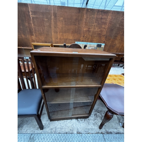 2610 - AN ENCYLOPEDIA BRITANNIA BOOKCASE WITH FOUR SLIDING GLASS DOORS, 26