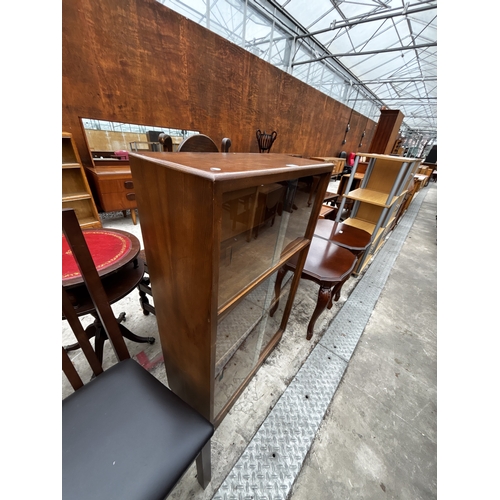 2610 - AN ENCYLOPEDIA BRITANNIA BOOKCASE WITH FOUR SLIDING GLASS DOORS, 26