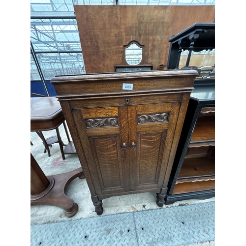 2619 - A MID 20TH CENTURY OAK H.M.V. GRAMOPHONE CABINET, LACKING WORKS