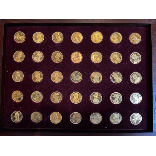 321 - A BOXED SET OF SEVENTY SILVER GILT SOVEREIGNS