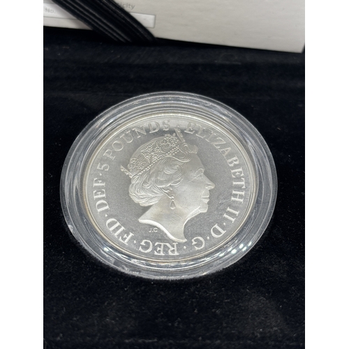 326 - A BOXED PROOF ELIZABETH II FIVE POUND SILVER COIN