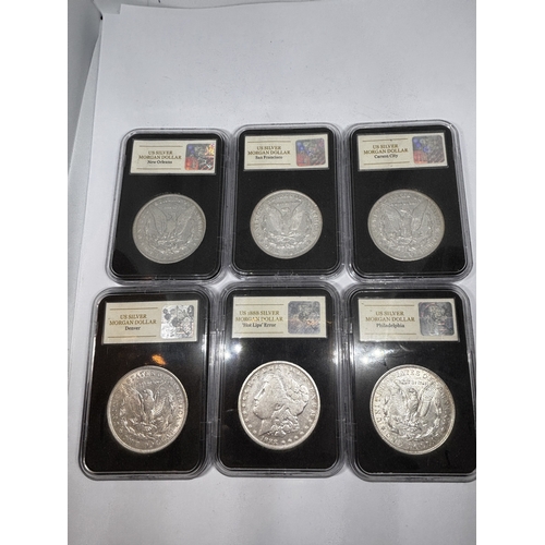 328 - A BOXED PROOF SET OF SIX U.S.A SILVER DOLLAR COINS