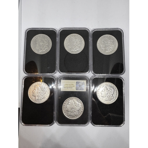 328 - A BOXED PROOF SET OF SIX U.S.A SILVER DOLLAR COINS
