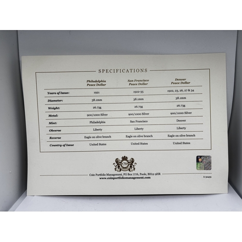 329 - A BOXED PROOF SET OF THREE U.S.A PEACE DOLLAR COINS