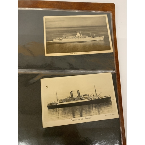 205 - AN ALBUM CONTAINING VINTAGE SHIPING POSTCARDS
