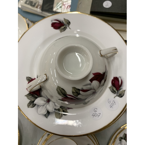 217 - A VERY LARGE COLLECTION OF DINNERWARE OF THE SAME PATTERN, SOME MARKED SHELLEY