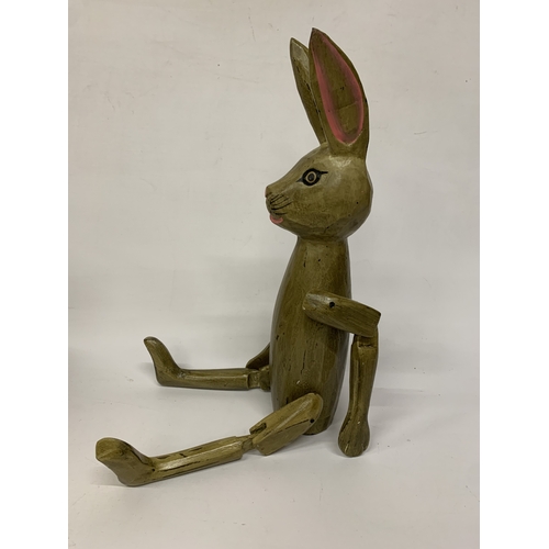 48 - A LARGE WOODEN ARTICULATED SHELF RABBIT, HEIGHT 58CM