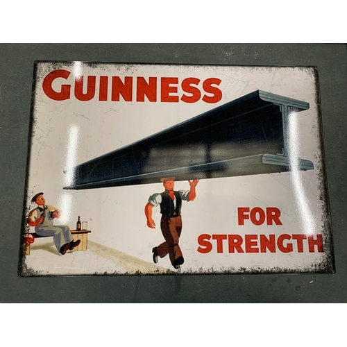 75 - A LARGE TIN PLATE SIGN, 'GUINNESS FOR STRENGTH', 50CM X 70CM