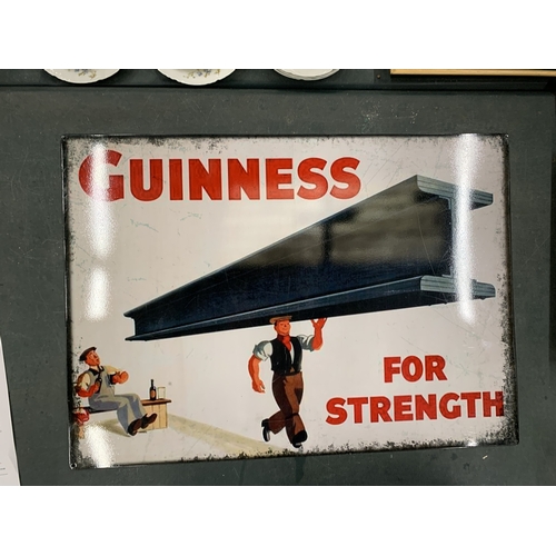 75 - A LARGE TIN PLATE SIGN, 'GUINNESS FOR STRENGTH', 50CM X 70CM