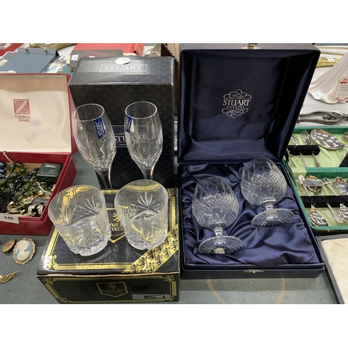 243 - TWO BOXES OF STUART CRYSTAL GLASSES TO INCLUDE BRANDY GLASSES, CHAMPAGNE FLUTES AND A FURTHER TWO ED... 